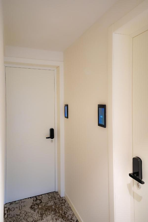 Bergamo Inn 15 Luaran gambar A wall mounted tablet